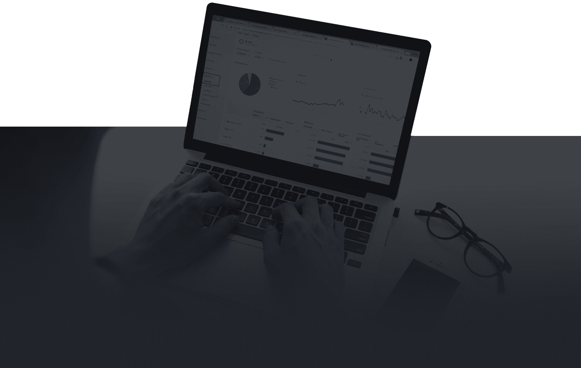 Laptop with support and marketing analytics | Web design, digital marketing, SEO, and more with JLB Works