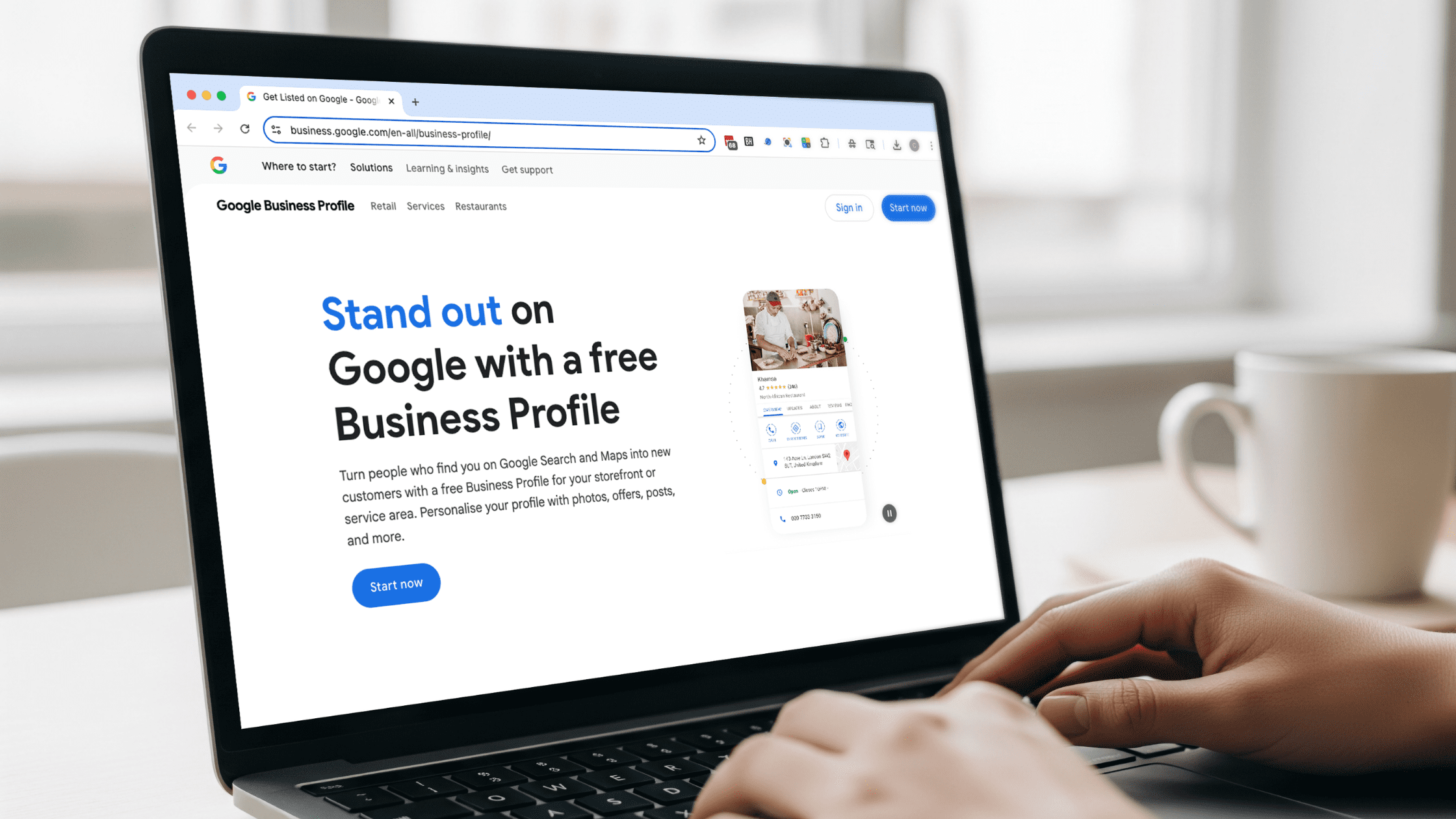 Person searching Google Business Profile information on laptop